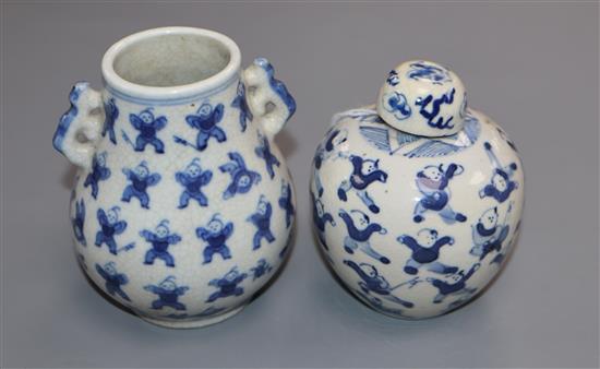 Two Chinese blue and white hundred boys vases, larger 8cm.